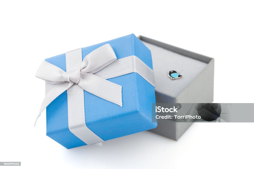 Small Blue And Gray Jewelry Gift Boxes With Bow Isolated On White  Background Stock Photo - Download Image Now - iStock