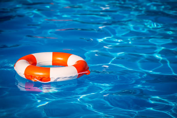 istock Life buoy in swimming pool 965103762