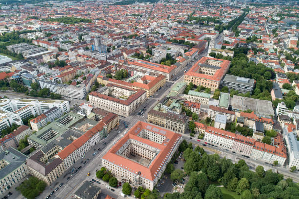 Munich Skyline with St. Ludwig Church and Siegestor, Ludwigstrasse, Germany Aerial of the famous St. Ludwig Church and Siegestor, Skyline of München, Ludwigstrasse, Deutschland siegestor stock pictures, royalty-free photos & images