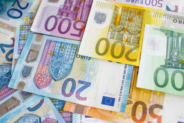 istock Background of euro bills. Shallow focus. 965117524