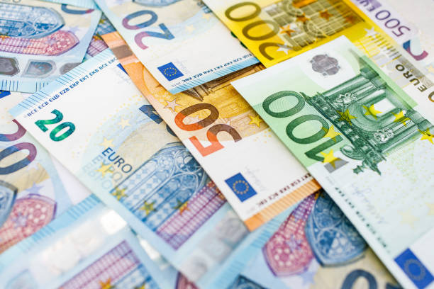 istock Background of euro bills. Shallow focus. 965117582