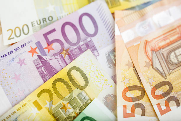 istock Background of euro bills. Shallow focus. 965117602