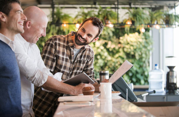 istock Three men meeting to discuss business 965117820