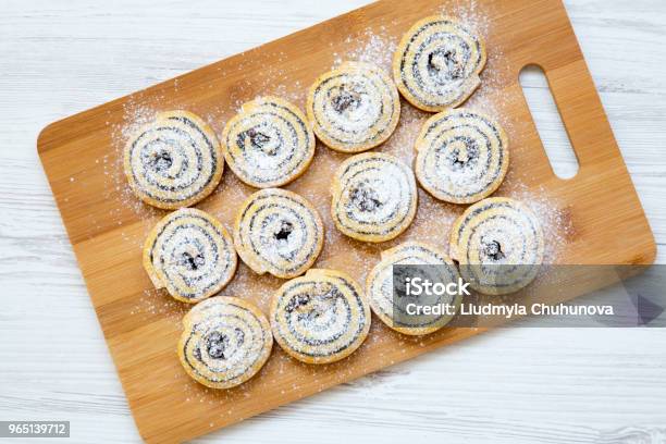 Top View Freshly Baked Cookies On A Bamboo Board On White Wooden Background Closeup From Above Stock Photo - Download Image Now