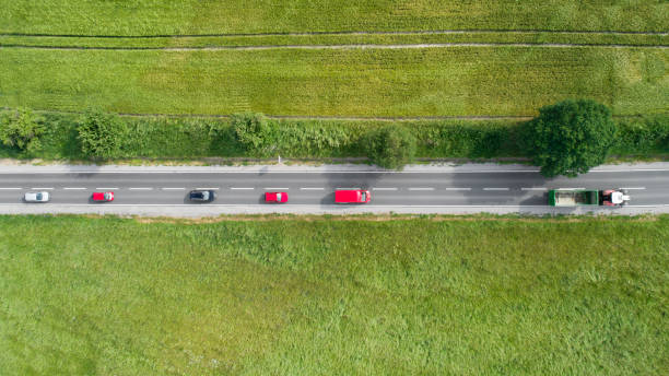 Road through agricultural area, aerial view