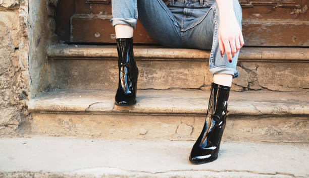 istock Woman in black boots 965145266