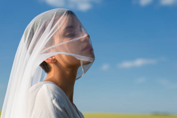 istock Woman  with veil on her face 965148562