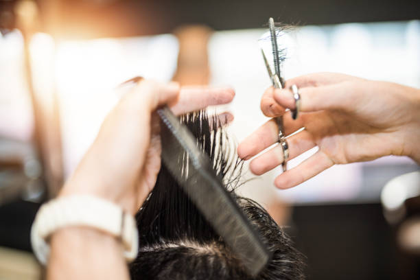 istock Motion photo of young unrecognizable man getting his haircut. 965162178