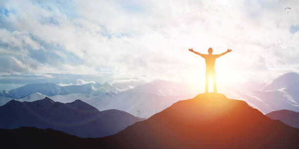 istock Male silhouette on sunrise background 965168666