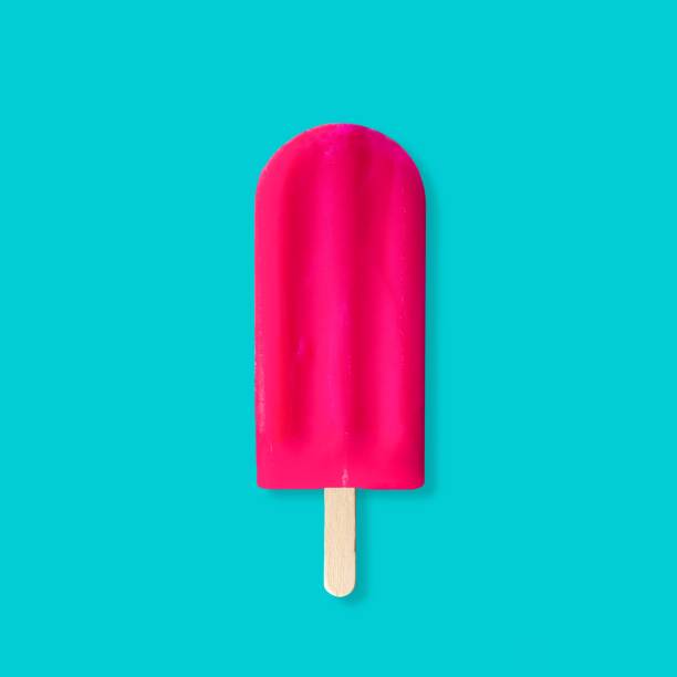 istock Pink popsicle against a pastel blue background 965188060