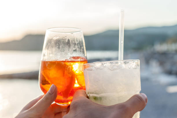 istock cheers two glasses with cocktails 965201604