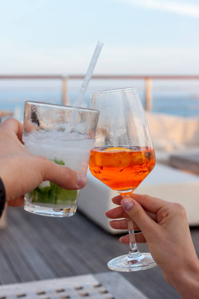 istock cheers two glasses with cocktails 965204066