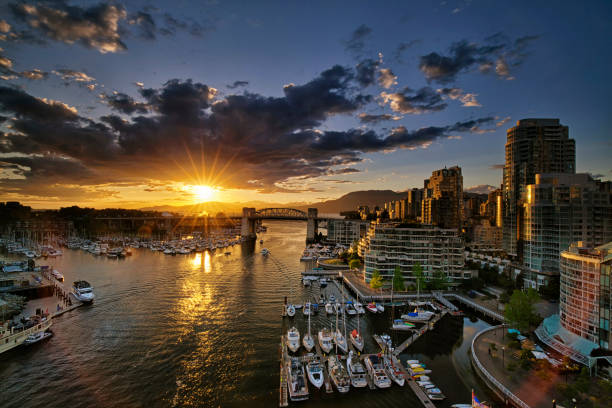 Granville island at sunset, Vancouver, Canada Panoramic view of False Creek in Spring in Vancouver, Canada granville island stock pictures, royalty-free photos & images