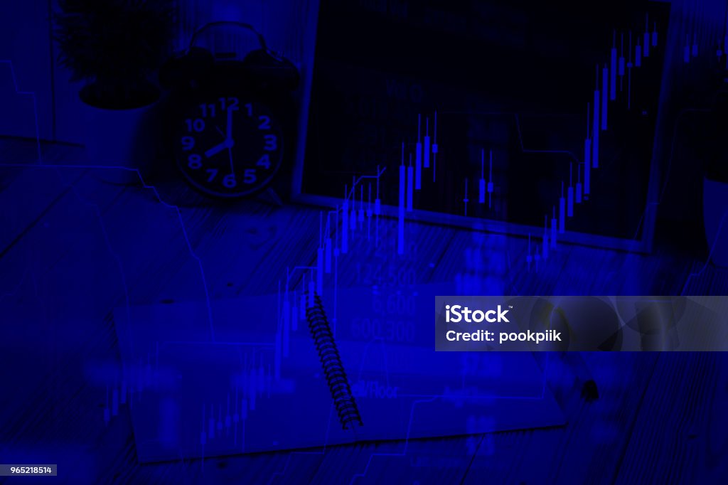 Double exposure coins stacks and alarm clock with green chalkboard, notebook and financial graph, with candle stick and stock market screen, business planning vision and finance analysis concept. Accountancy Stock Photo