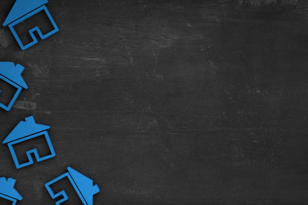 Real Estate House on Blackboard Background Copy Space