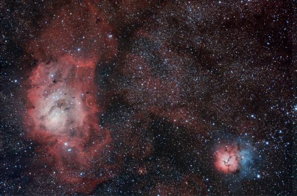 istock M8 and M20 The Lagoon and Trifid Nebula 965243710