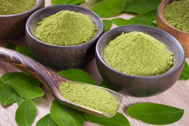istock leaves and moringa powder 965246104