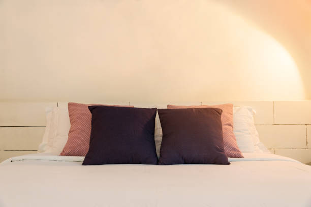 istock stacking of backrest pillow and white pillow on bed and white brick wall, interior modern bedroom 965246364