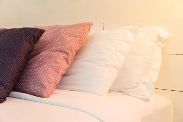 istock stacking of backrest pillow and white pillow on bed and white brick wall, interior modern bedroom 965246380