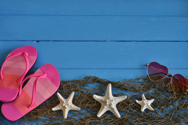 istock White Starfish and Pink Sandals 965248442