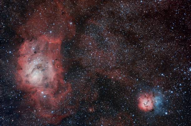 istock M8 and M20 The Lagoon and Trifid Nebula 965248590