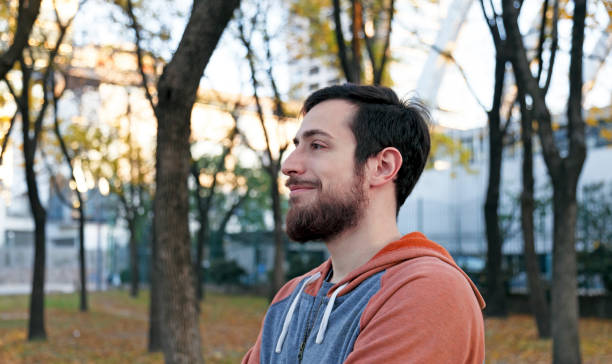 istock Happy young man at the park 965261852