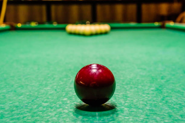 istock Red ball on the green cloth. Russian billiard 965273356