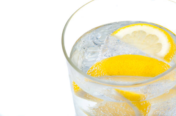 istock A glass beaker with crystal clear water, lemon and ice cubes. 965282116