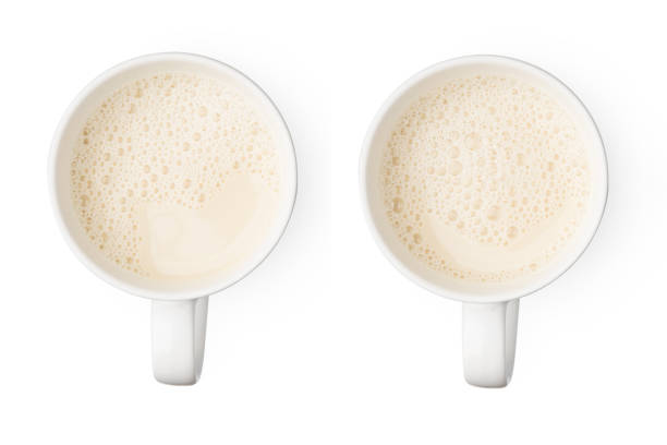 istock Two cup with soy milk different bubble foam on top view isolated texture on white background food and hot drink object design 965294566