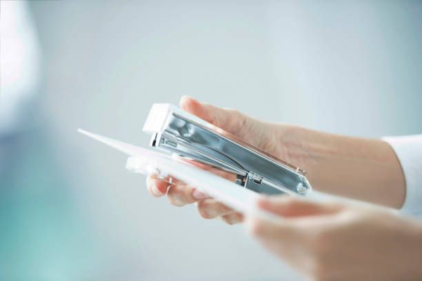 Staple In Paper 14,000+ Stapled Papers Stock Photos, Pictures & Royalty-Free Images ...