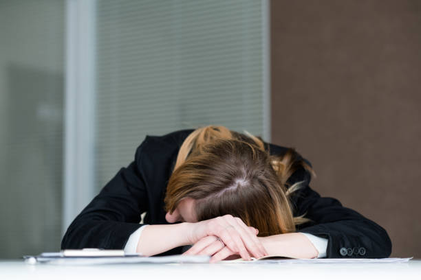 istock overworking fatigue workaholic tired woman office 965327672