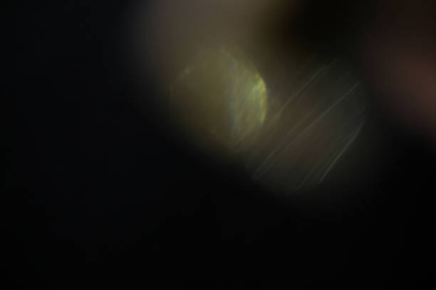 istock lens flare colorful abstract bokeh light black 965337246