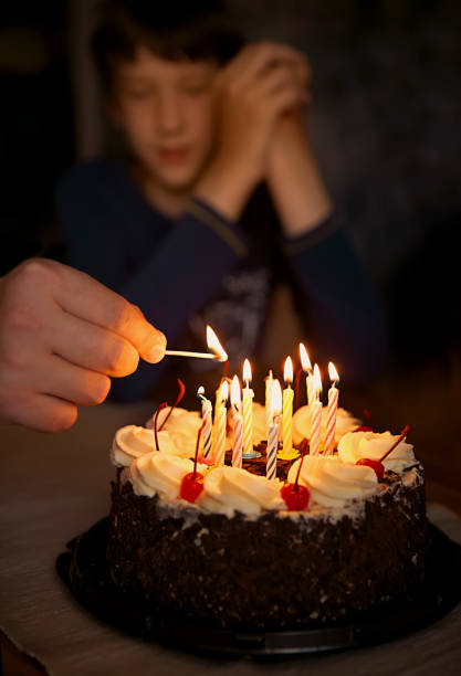 istock Festive candles are lit on the birthday cake 965341906