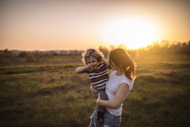 istock Mother and son in nature 965343026