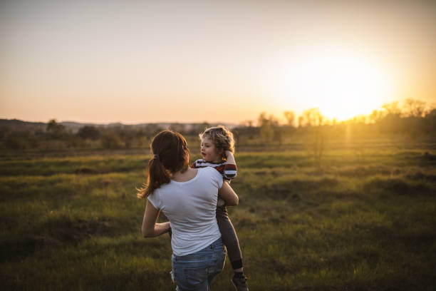 istock Mother and son in nature 965345394