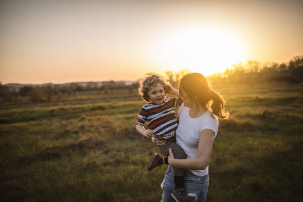 istock Mother and son in nature 965345638