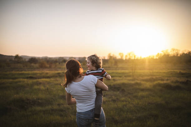 istock Mother and son in nature 965345740