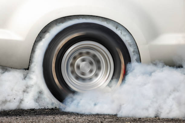 Damaged wheels and old Tire of car in the garage change and repair concept