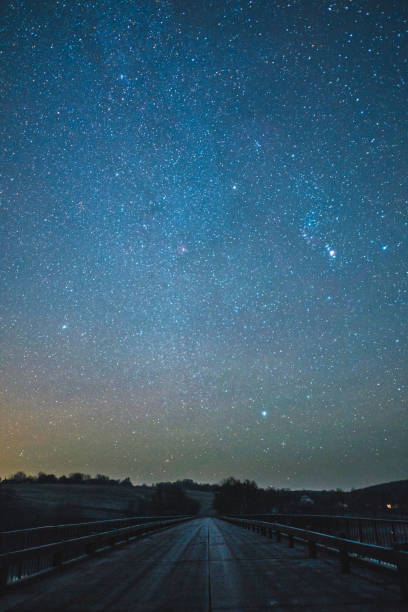 istock Night sky over rural landscape. 965353974