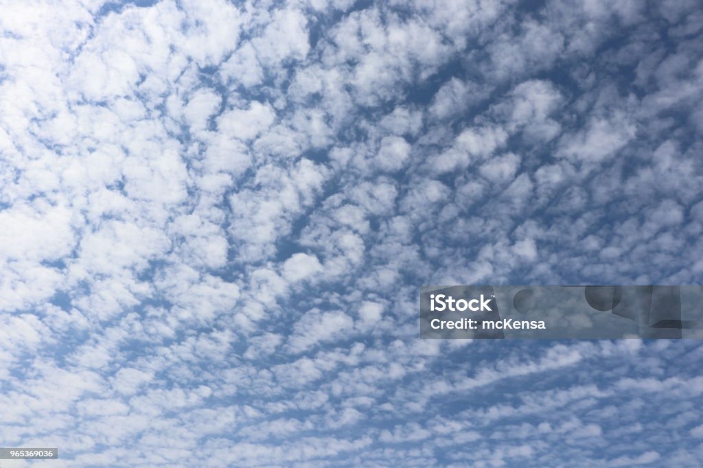 Fluffy white clouds, full frame cloudscape Full frame cloudscape Backgrounds Stock Photo