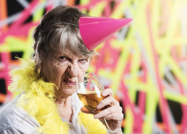 Old Woman In Party Gear With Champagne Is Very Irritated Stock Photo -  Download Image Now - iStock