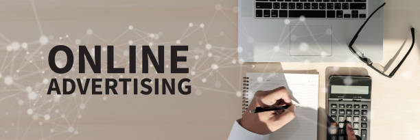 istock ONLINE ADVERTISING Business team work with financial reports banner with copy space 965380868