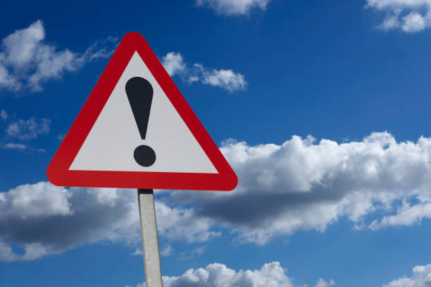 istock ROAD TRAFFIC EARNING SIGN WITH EXCLAMATION MARK 965380890