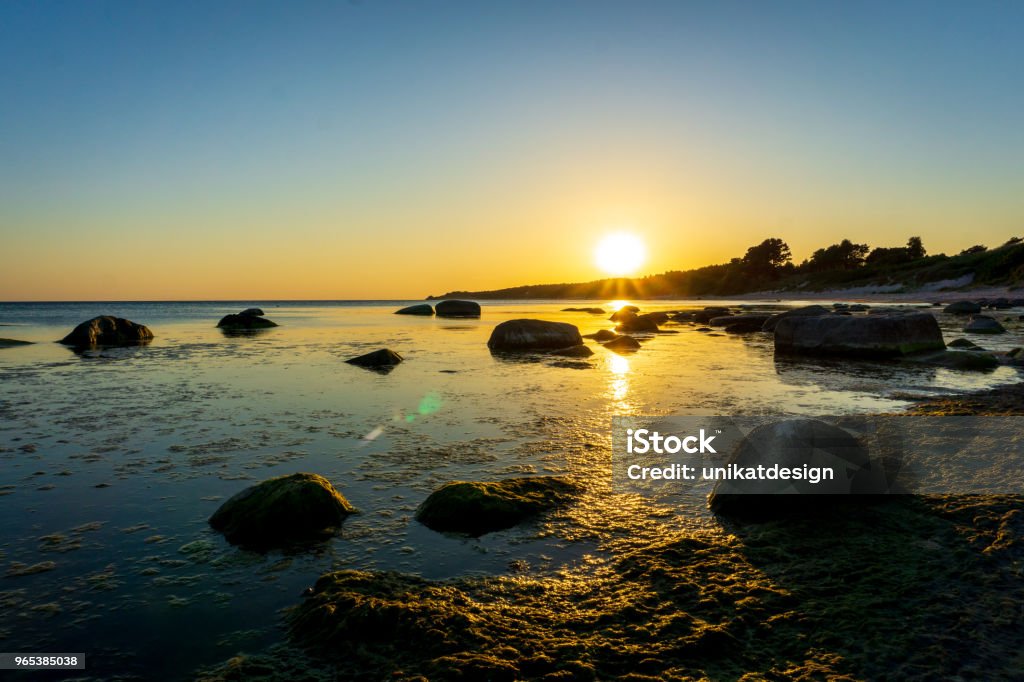 Idyllic sunset in Bornholm, Denmark on a day in summer Backgrounds Stock Photo