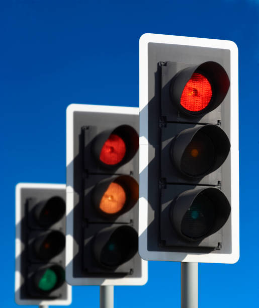 istock THREE TRAFFIC LIGHTS SHOWING GREEN AMBER RED 965388228