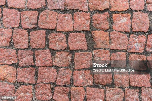 Red Pebble Stones Road Surface Stock Photo - Download Image Now - Abstract, Backgrounds, Brick