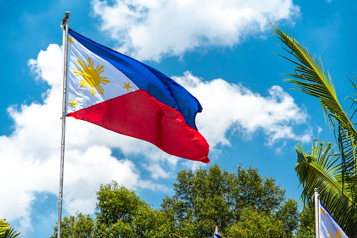 Philippines National flag flying in the wind, Philippines