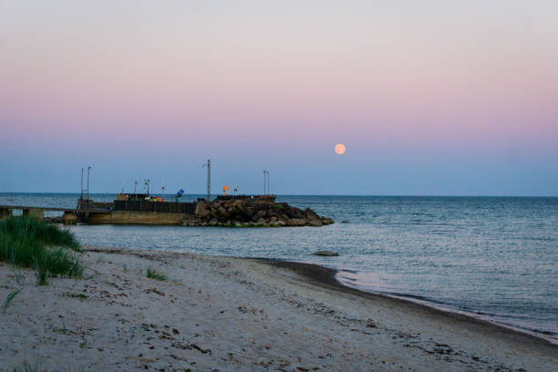 istock Moon is rising over idyllic Bornholm, Denmark on a day in summer 965396906