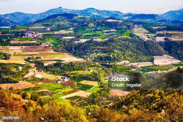 Countryside Panorama With Farms And Houses And Cultivated Fields Stock Photo - Download Image Now