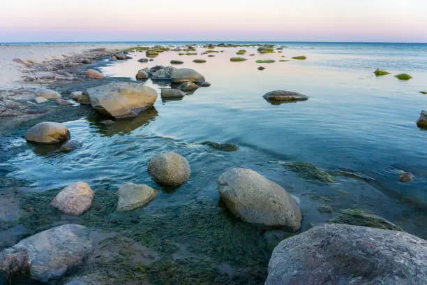 Idyllic Baltic sea with rocks in Bornholm, Denmark on a day in summer